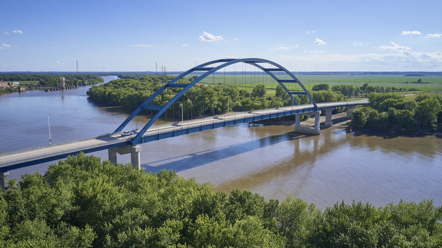 An aerial view of a bridge over a river.