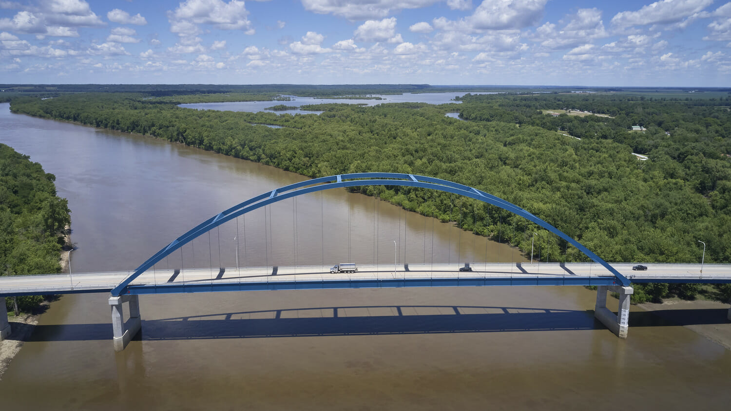 An aerial view of a bridge over a river.