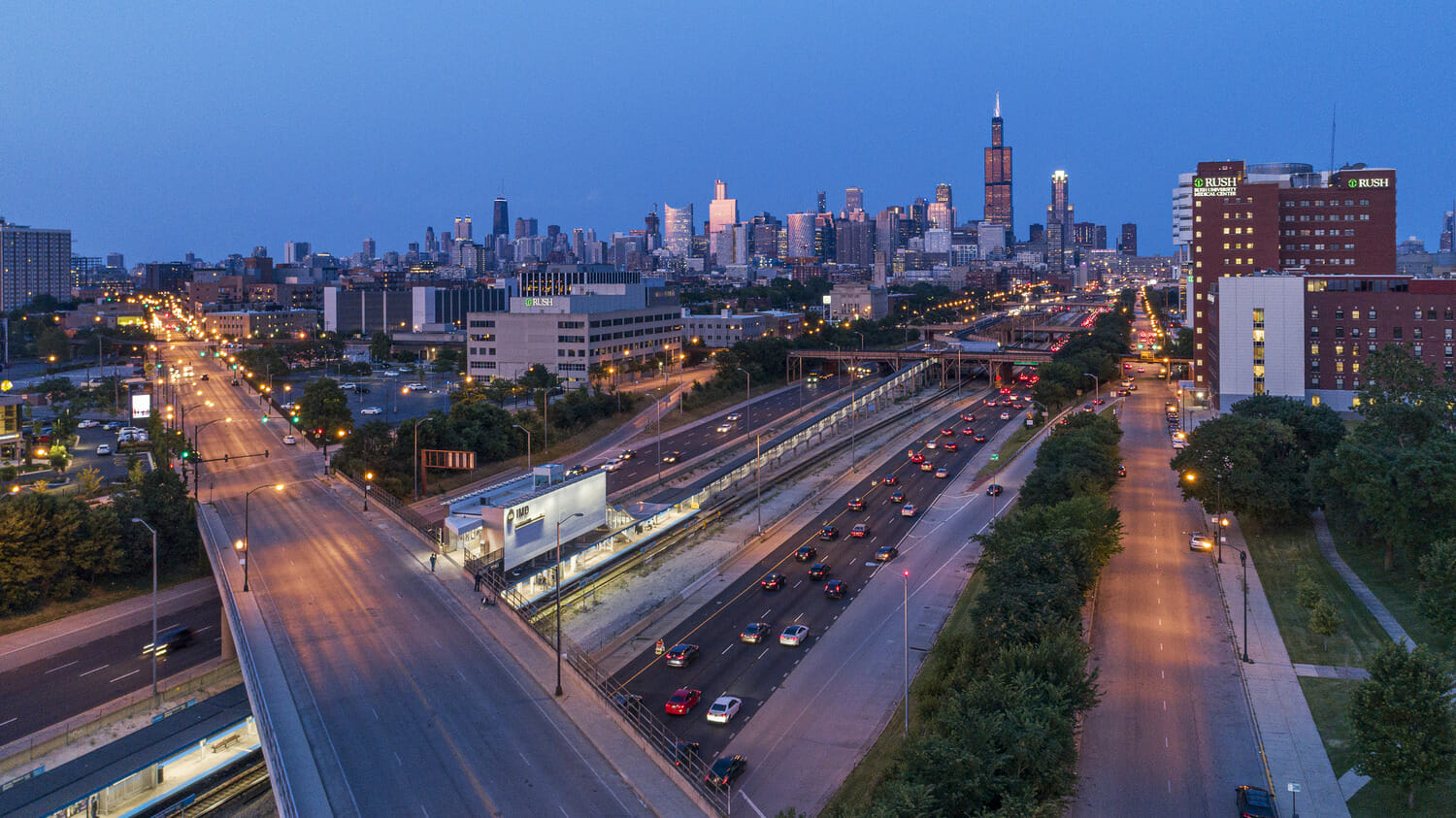 A city skyline at dusk.