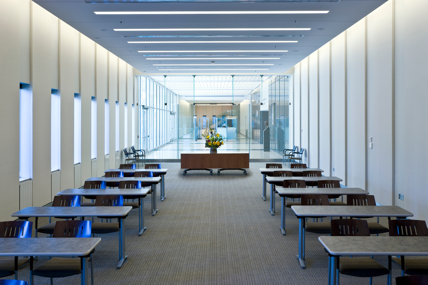 A row of tables in a room.