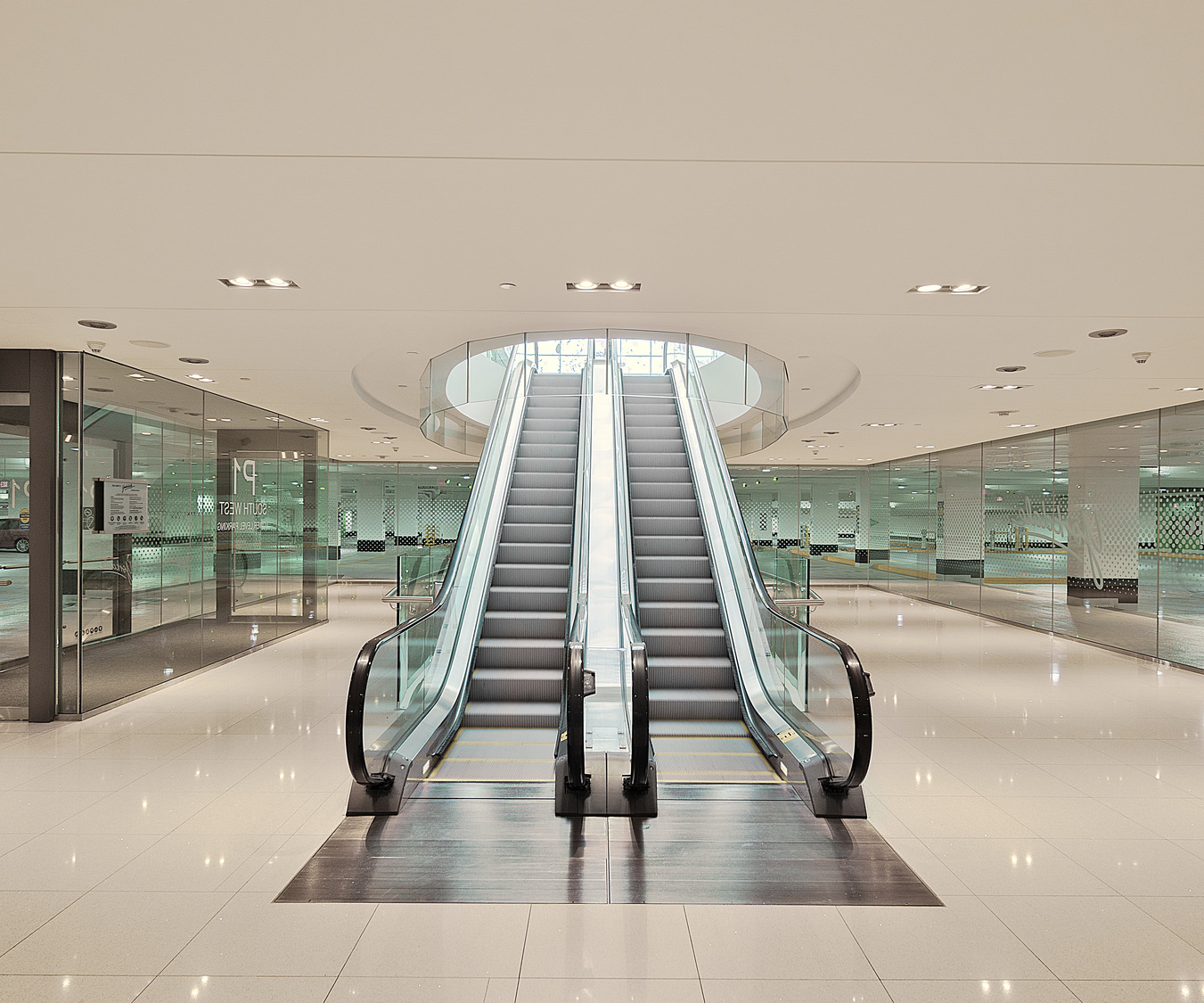 An escalator in a shopping mall.