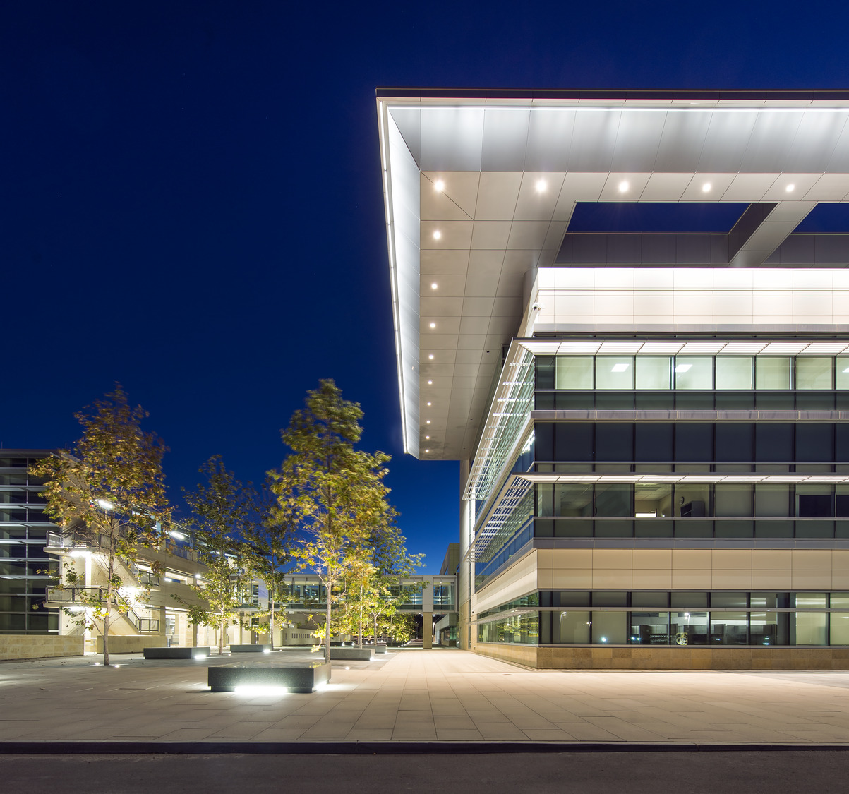 The building is lit up at night.