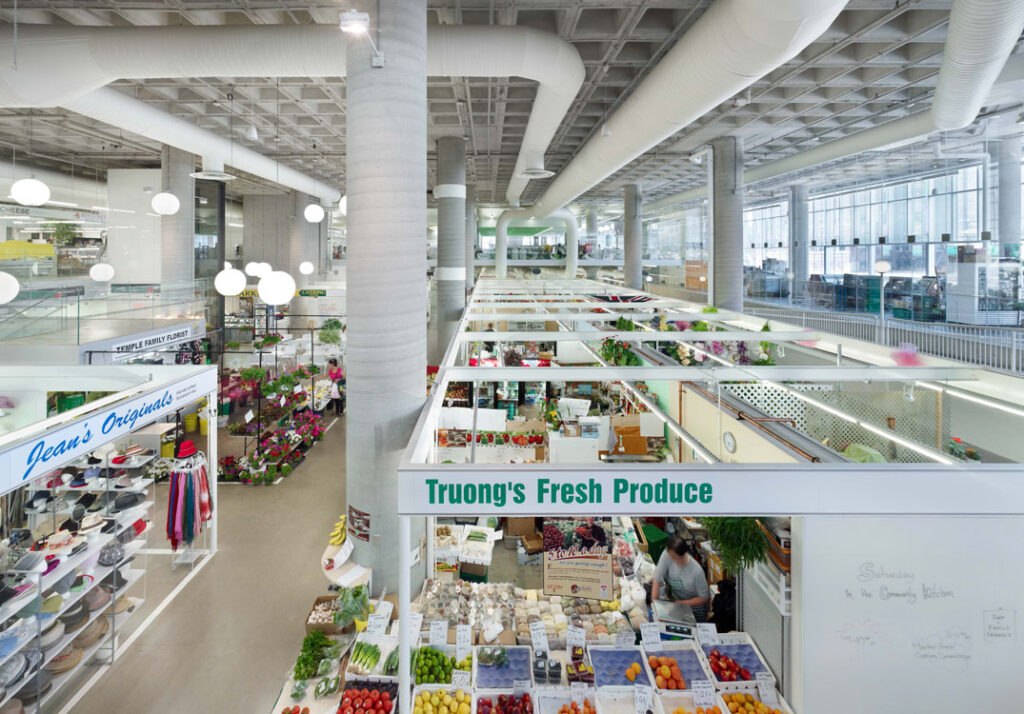The interior of a grocery store with a lot of produce.