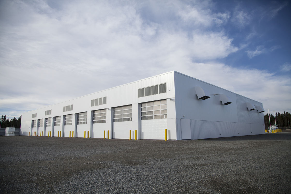 A large white building with a lot of windows.