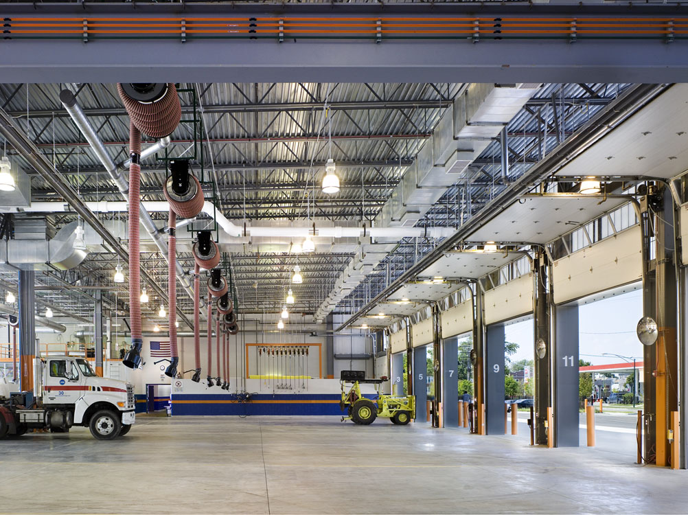 A truck is parked in a warehouse.