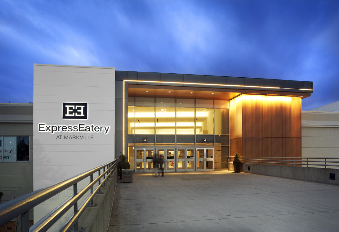 The entrance to the expo center at dusk.