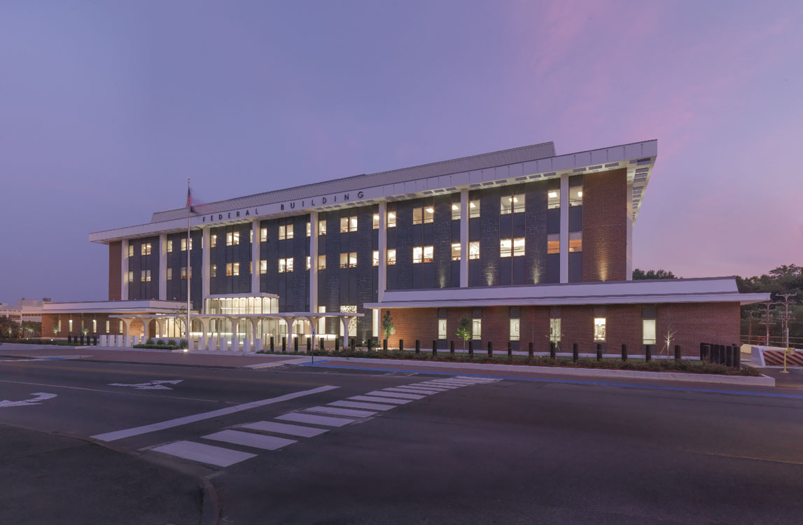 A large building at dusk.