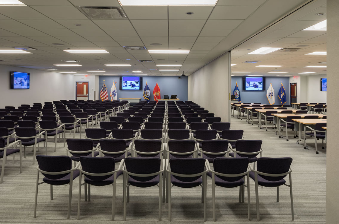 Rows of chairs in a conference room.