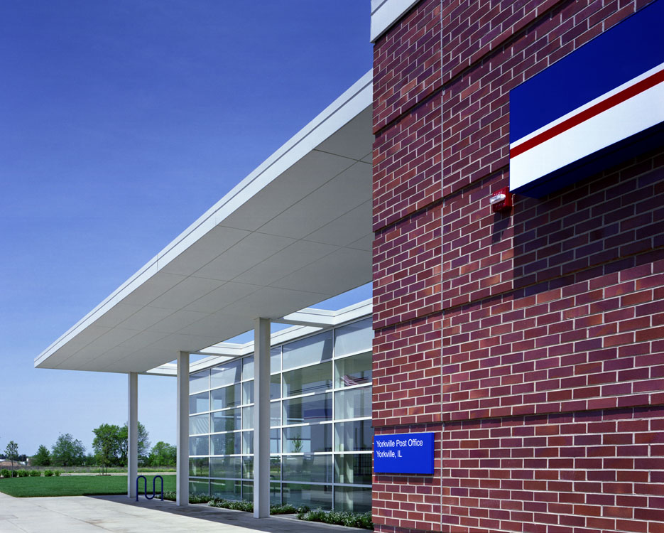 A building with a red, white and blue sign.