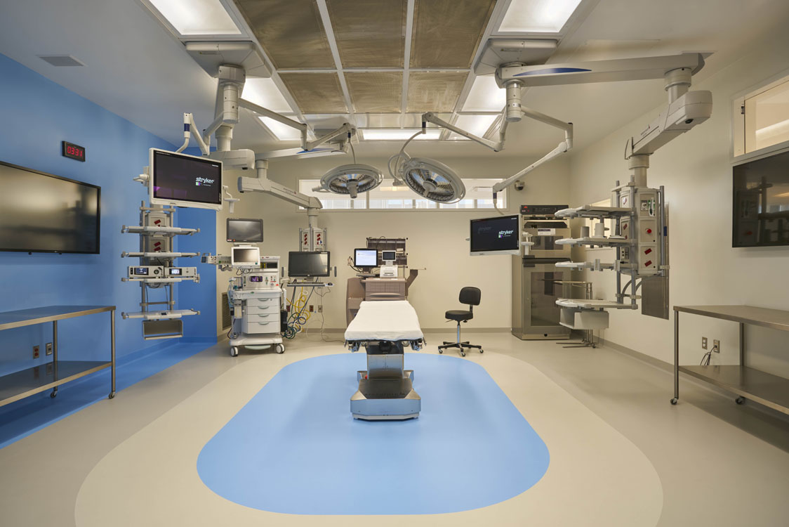 A blue floor in a medical room.