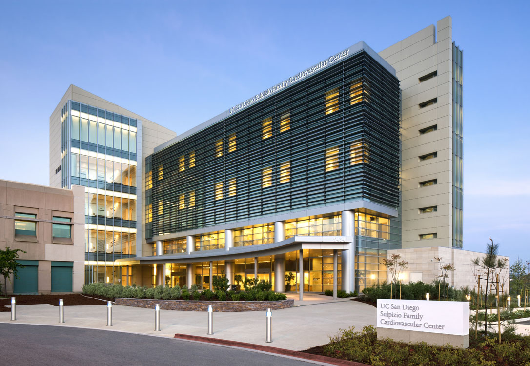 The exterior of a building with a large glass facade.