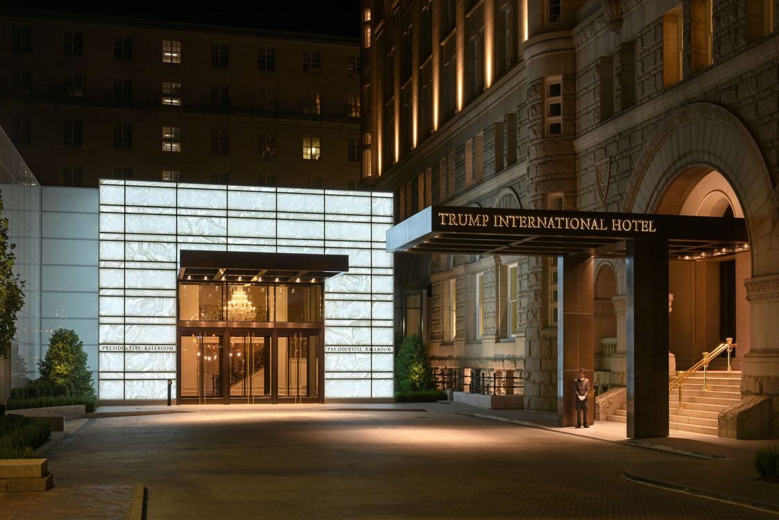 The entrance to the international hotel at night.