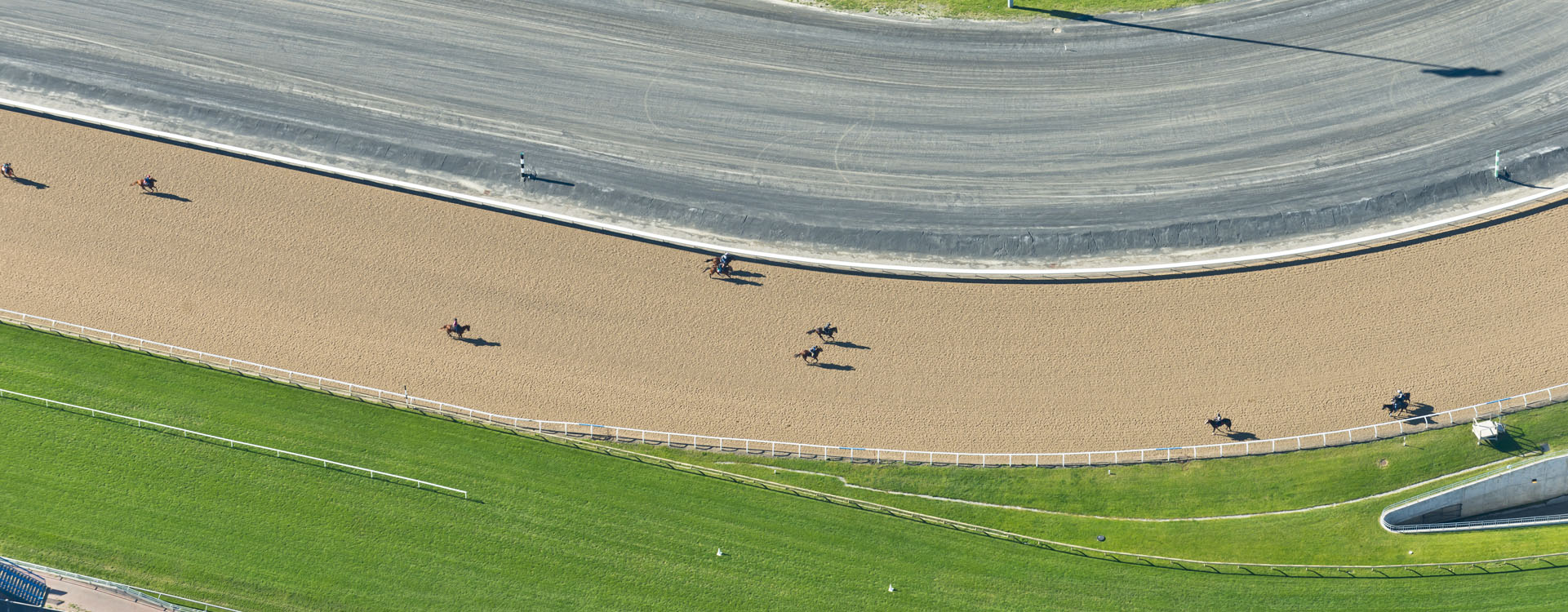 An aerial view of a horse race track.