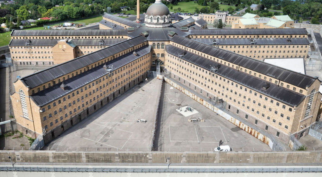 An aerial view of a large building in a city.