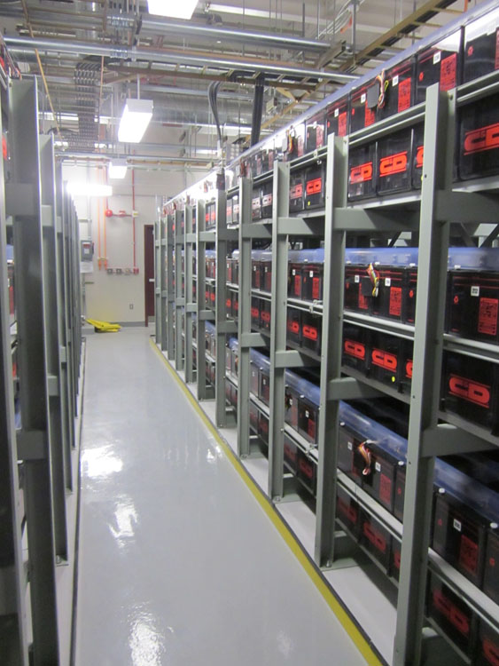 A row of shelves in a large warehouse.