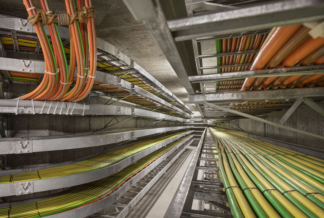 A large amount of wires in a large building.