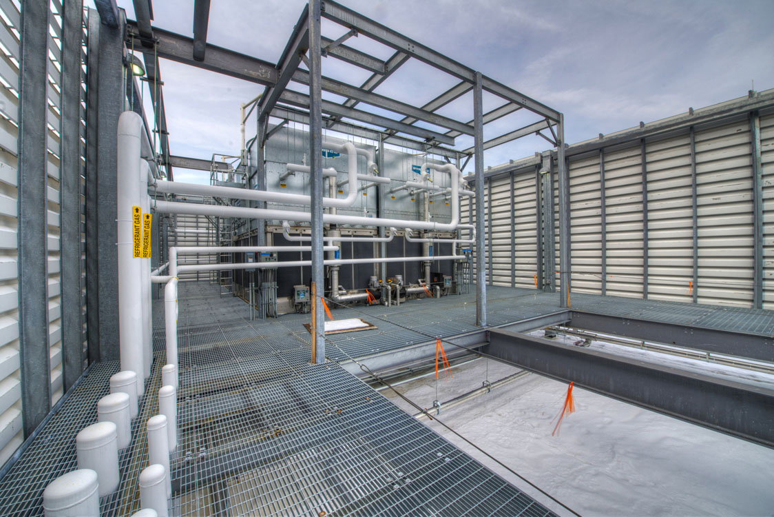 The inside of a building with pipes and pipes.