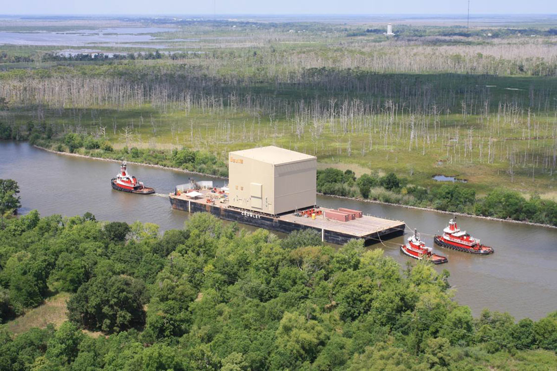 An aerial view of a nuclear power plant on a river.