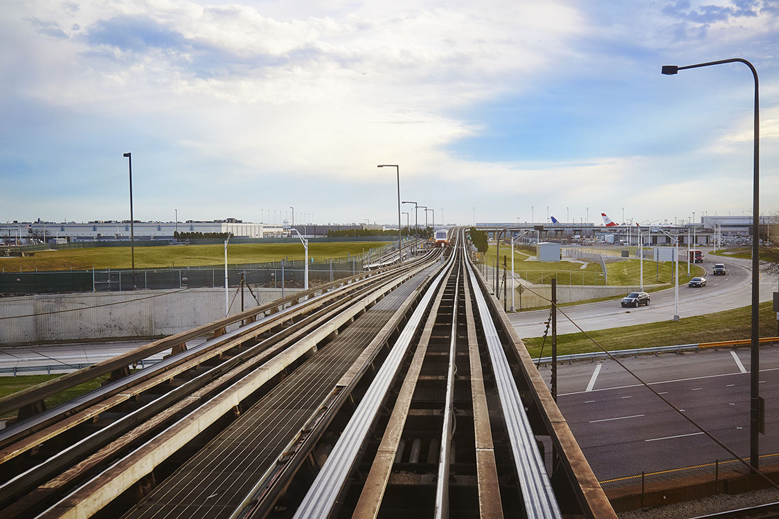 A train track with cars on it.