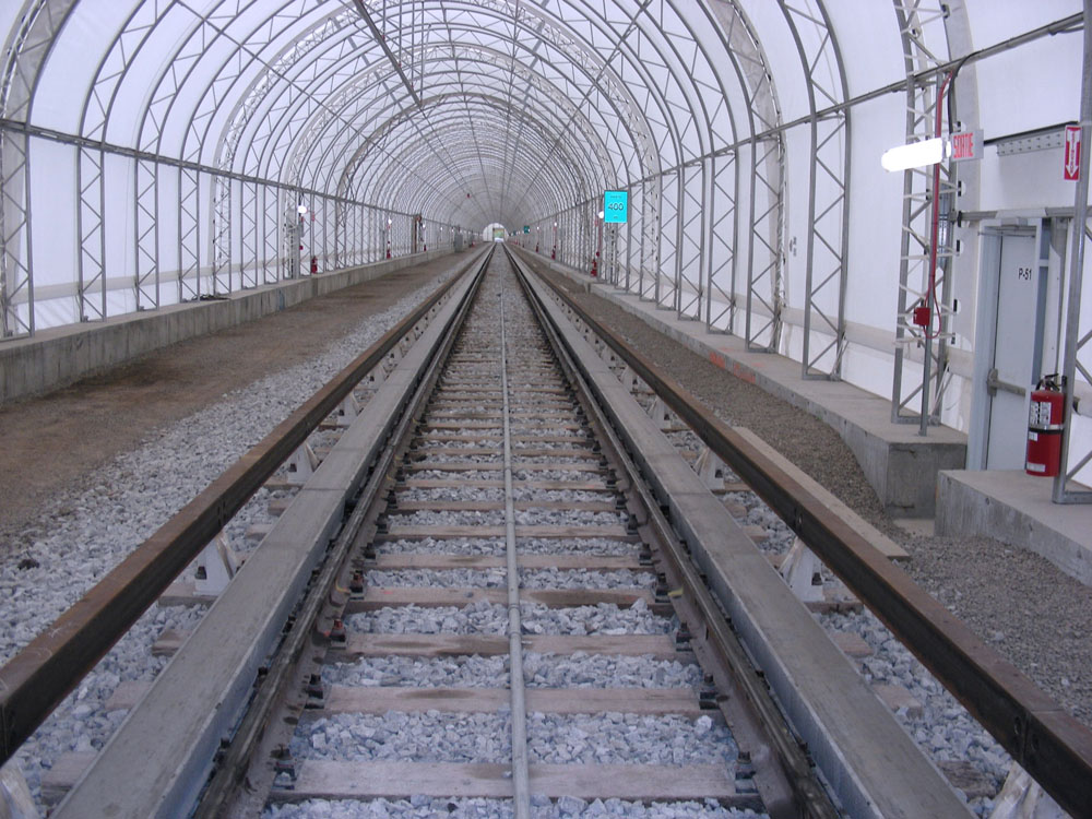 A train track in a tunnel.
