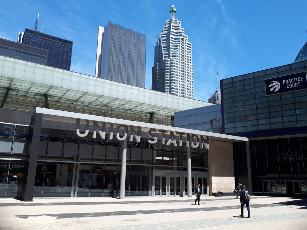 The toronto union station is in the middle of a city.