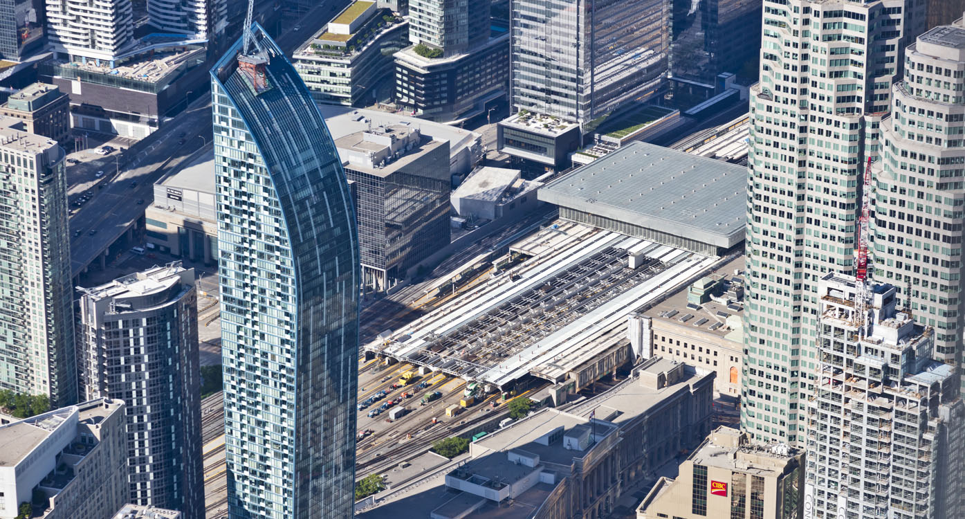 An aerial view of a city with tall buildings.