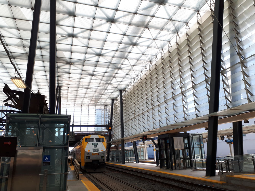 A train pulls into a train station.