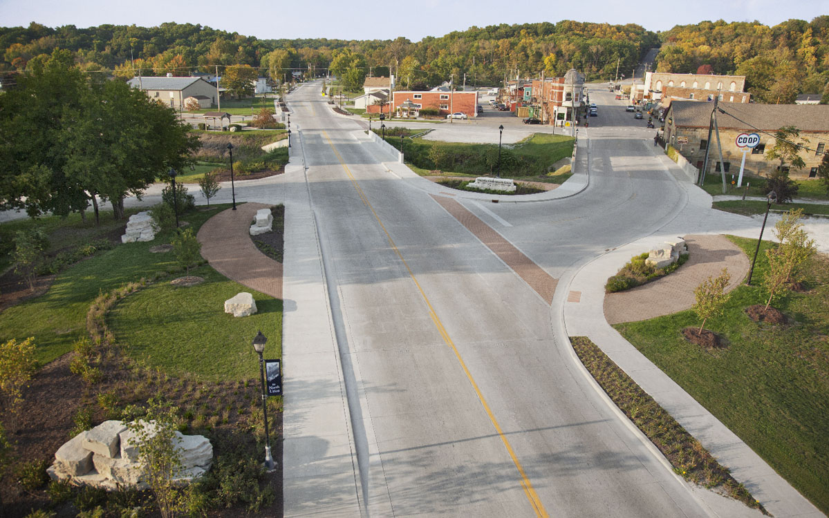 An aerial view of an intersection in a town.