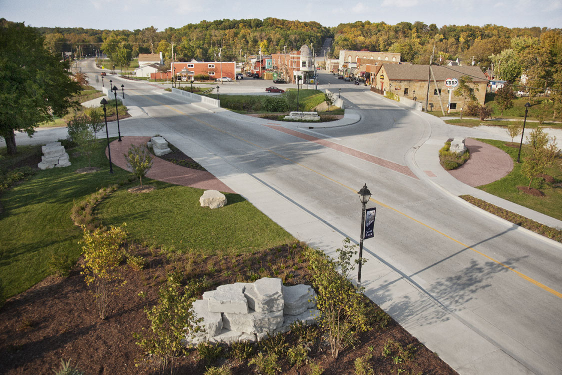 An aerial view of an intersection in a town.