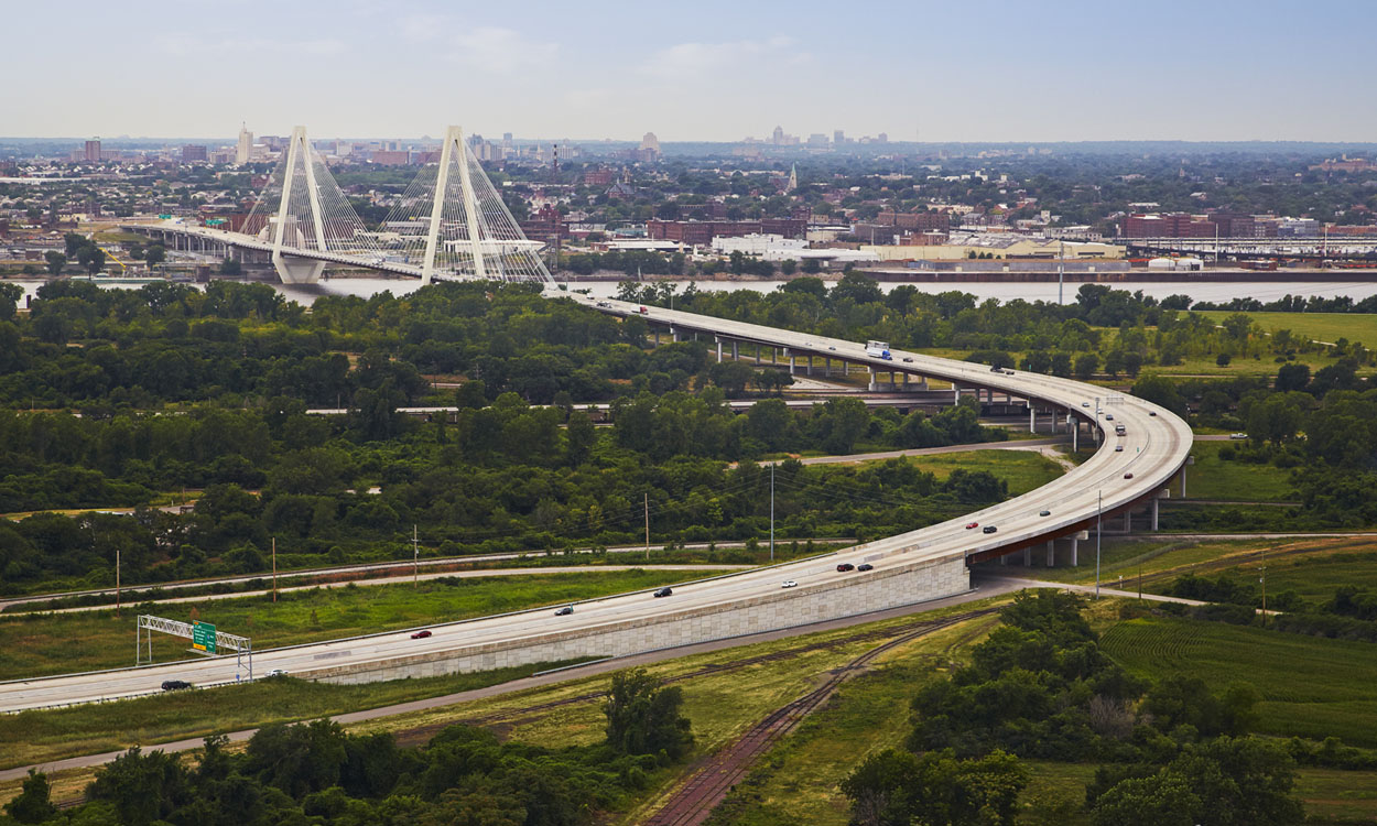 An aerial view of a bridge over a city.