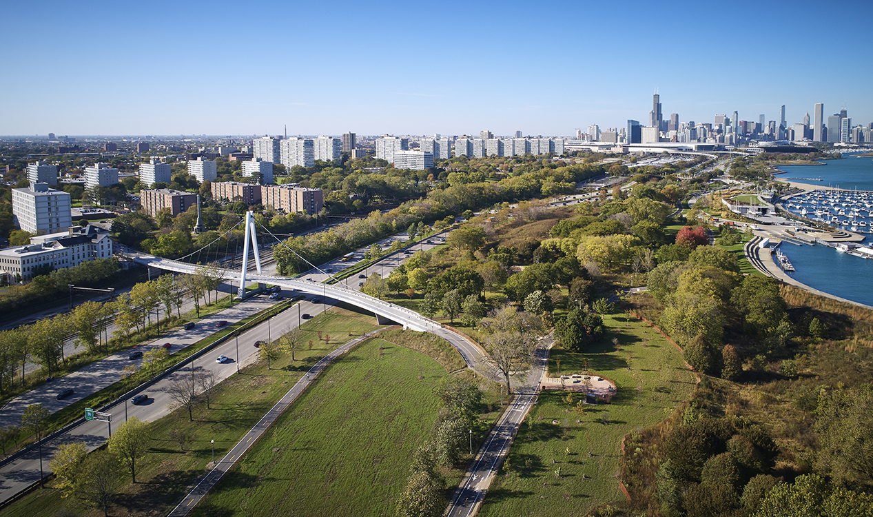 An aerial view of a city and a bridge.