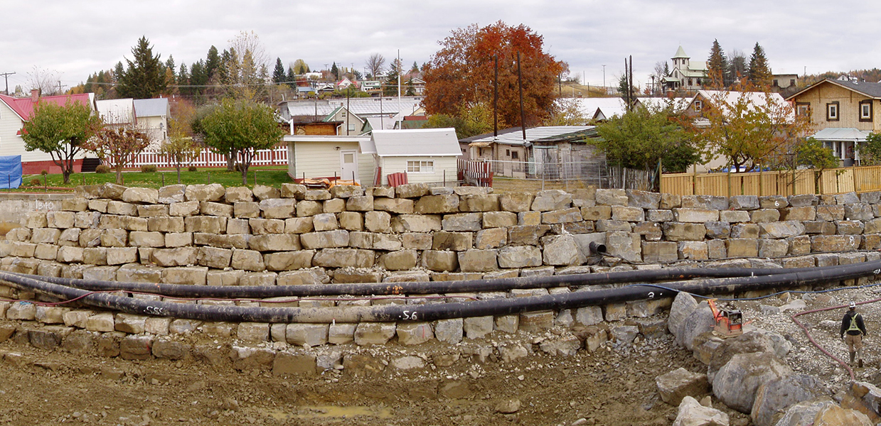 A brick wall transformed and studied by geoscientists in the middle of a town.