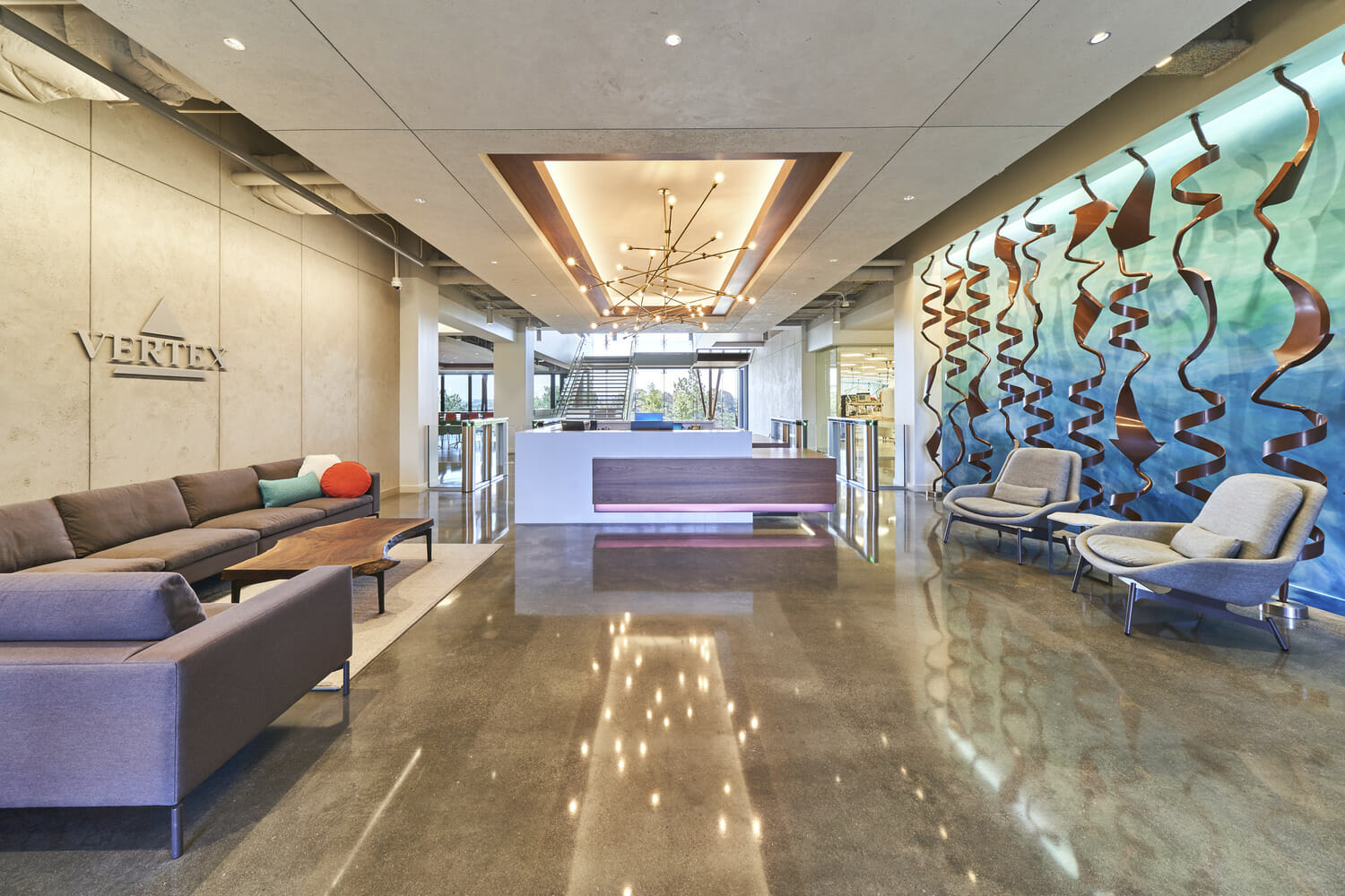 The lobby of a futuristic office building.