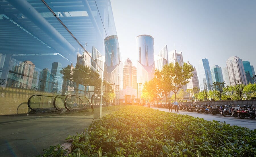 A view of a city with tall buildings in the background.