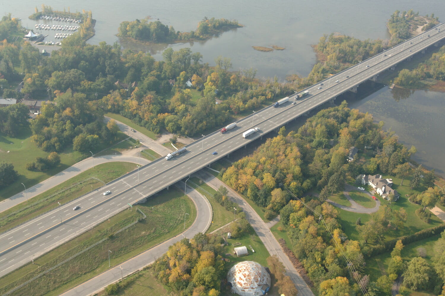 An aerial view of a bridge over a lake.