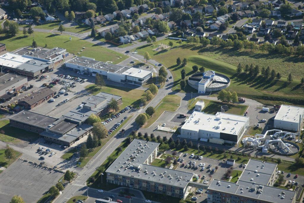 An aerial view of a campus with many buildings.