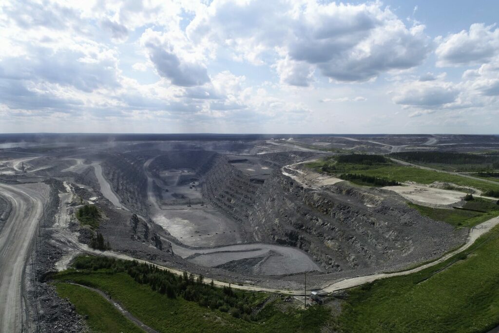 An aerial view of an open pit mine.