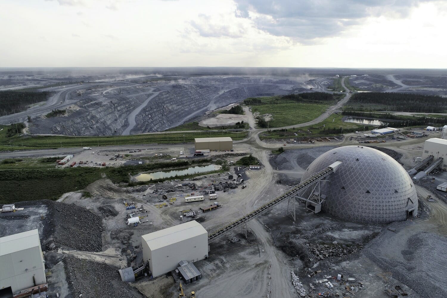 An aerial view of an open pit mine.