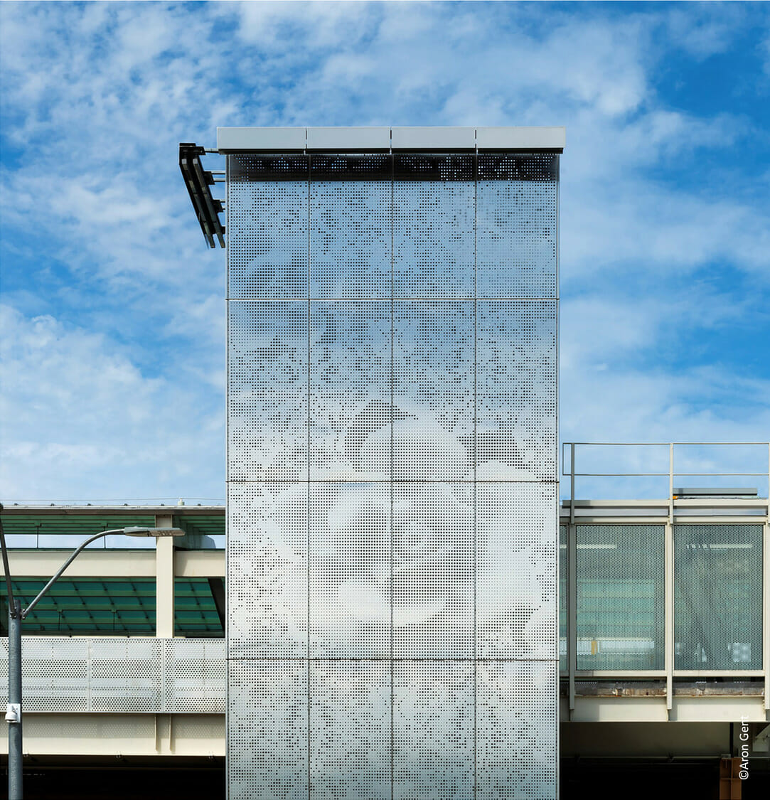 A glass building with a rose on it.