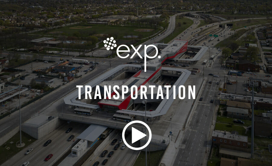 An aerial view of a highway with the words exp transportation.