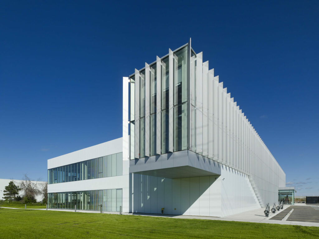 A modern building with a glass facade.