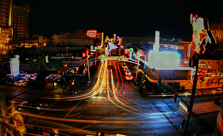 A long exposure of a city street at night.