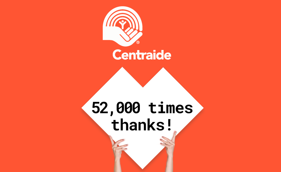 A person holding up a heart with the words centaride 5 000 times thanks.
