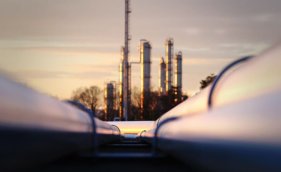 A group of pipes at sunset.