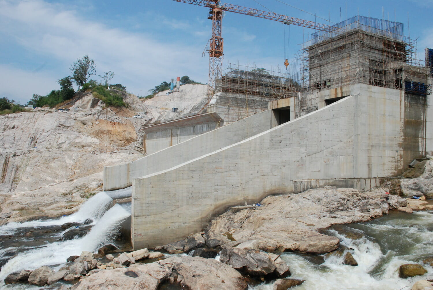 Construction of a dam on a river.