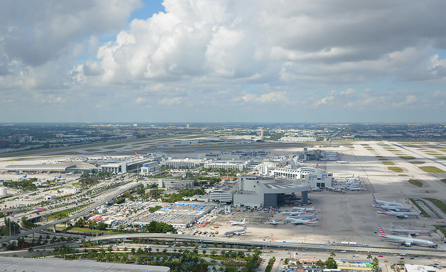 A view of an airport from the top of a building.