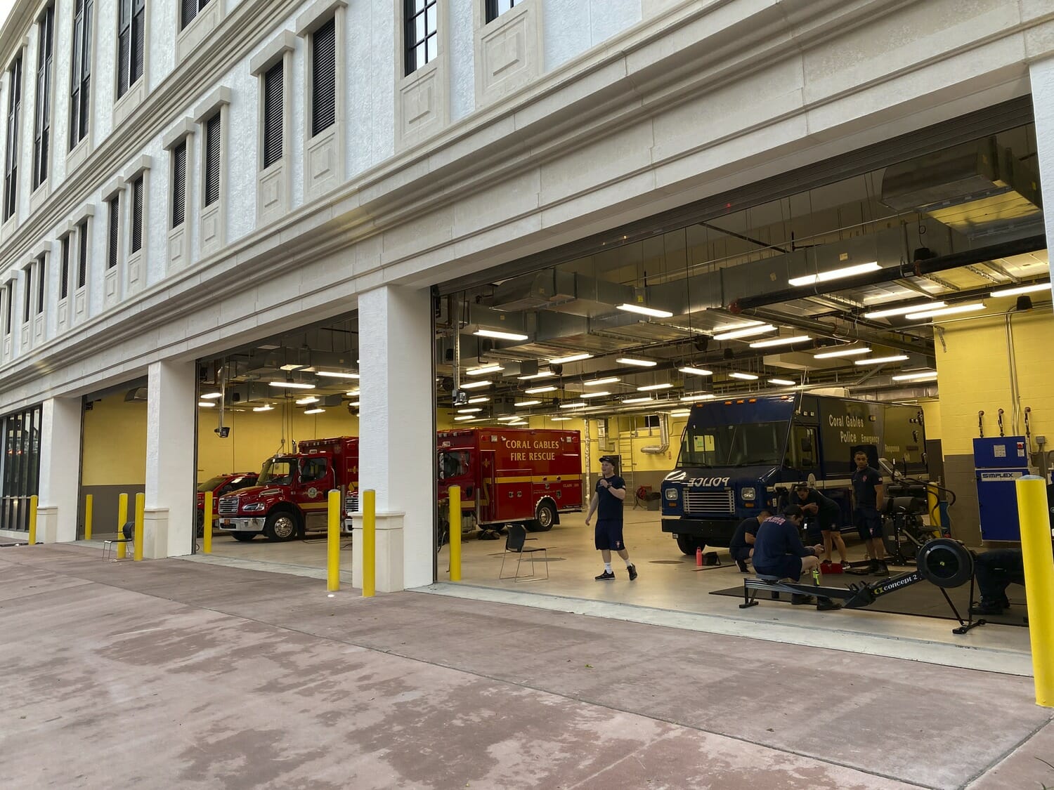 A fire truck is parked in front of a building.