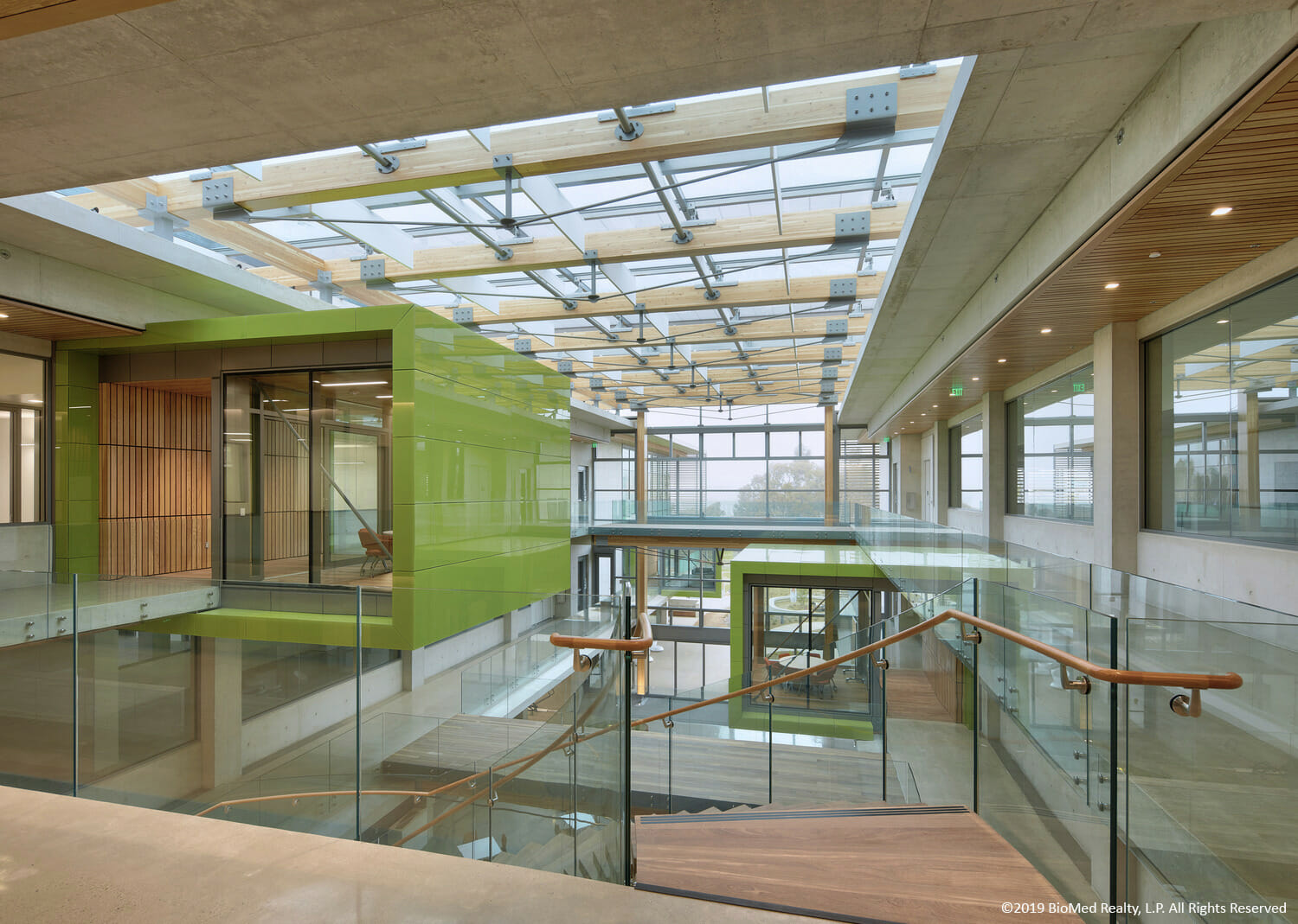 A green staircase in a building.