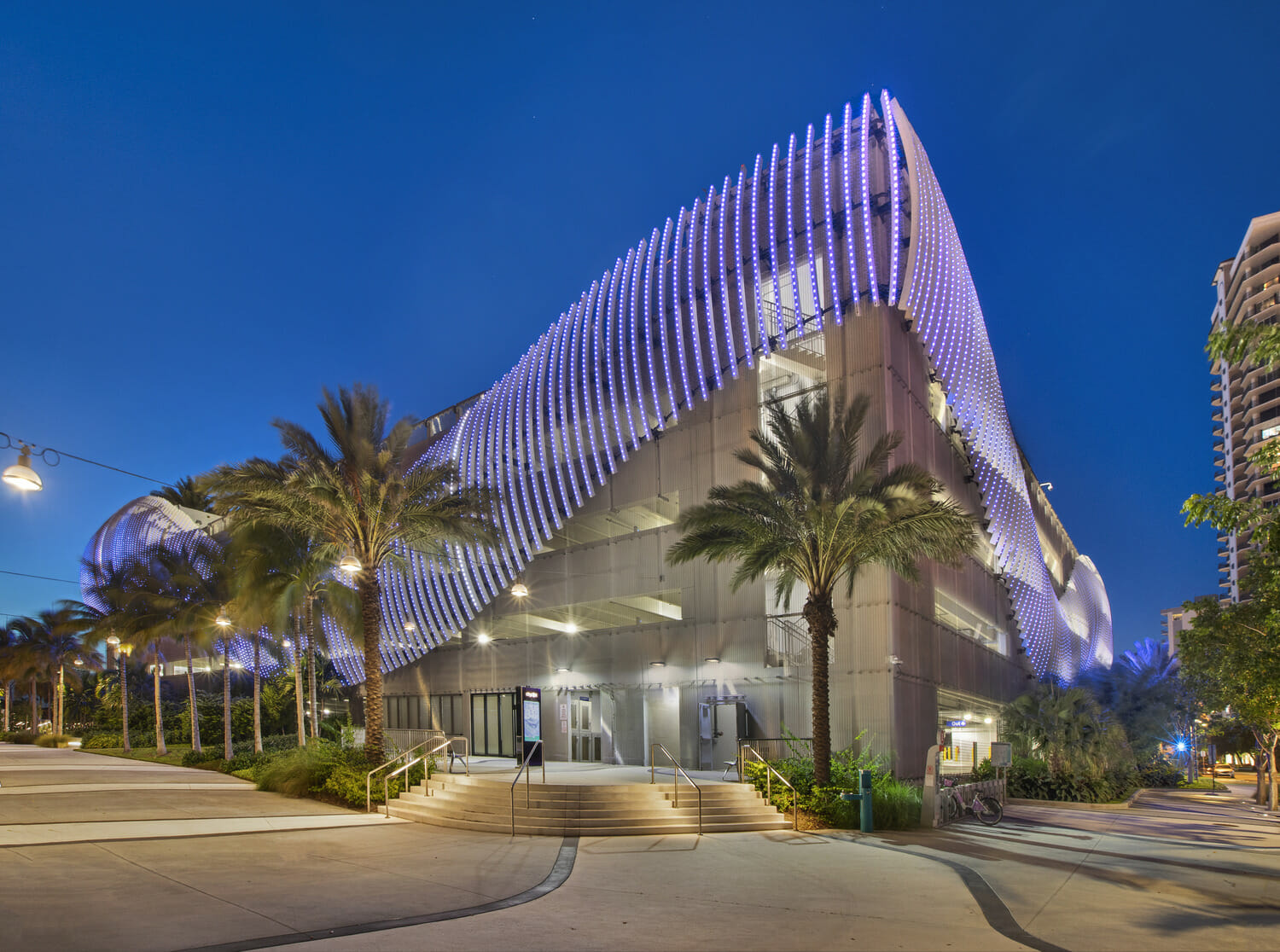 The building is lit up at night.