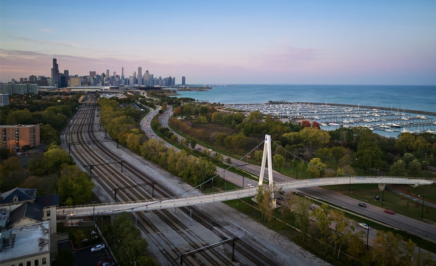 An aerial view of the chicago skyline and train tracks.